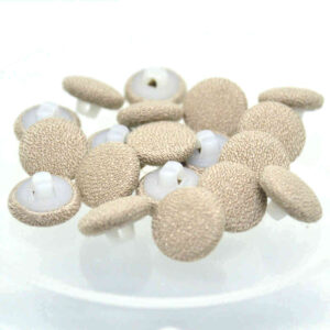 beige fabric buttons