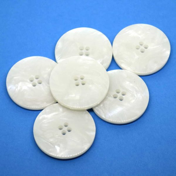 White pearlescent buttons