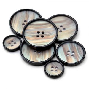 Black rim pearlescent button