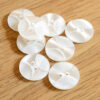 White semi grooved buttons