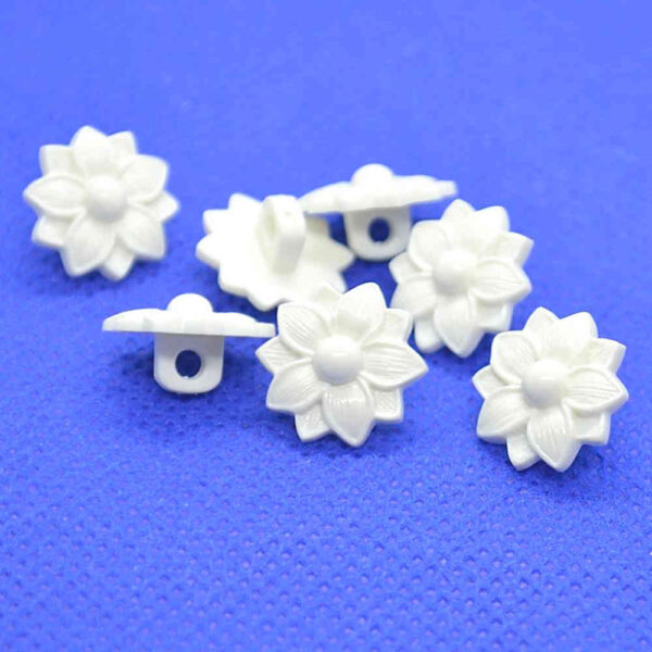 white flower buttons