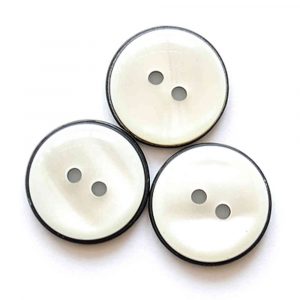 Black rim white pearlescent buttons
