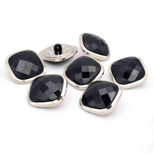 Black faceted square buttons