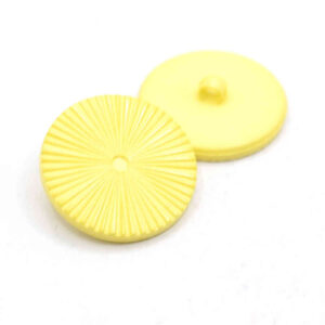 Yellow grooved buttons